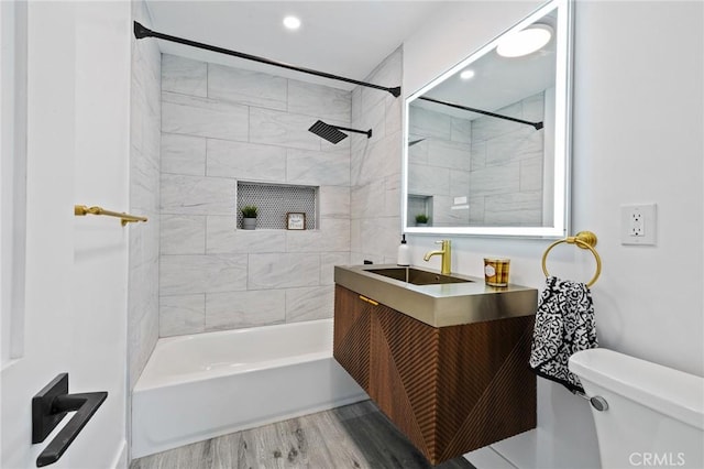 4930 W 142nd St, Hawthorne, CA 90250 - bathroom featuring wood finished floors, toilet, vanity, and shower / tub combination