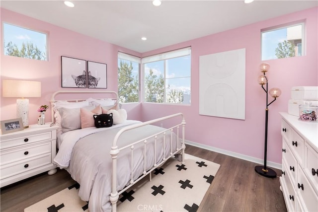 980 N Tangent Privado Unit 201, Ontario, CA 91764 - bedroom with recessed lighting, wood finished floors, and baseboards