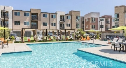 980 N Tangent Privado Unit 201, Ontario, CA 91764 - community pool featuring a patio