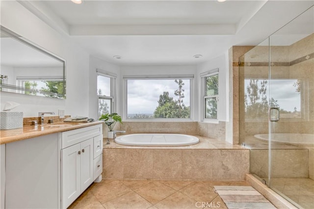 18238 Hastings Way, Porter Ranch, CA 91326 - full bathroom featuring healthy amount of natural light, vanity, a garden tub, a stall shower, and recessed lighting