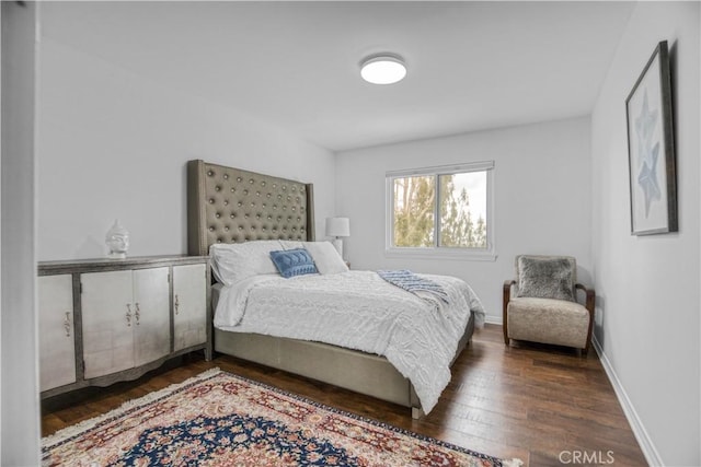18238 Hastings Way, Porter Ranch, CA 91326 - bedroom with dark wood-style flooring and baseboards