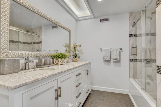 18238 Hastings Way, Porter Ranch, CA 91326 - full bath featuring double vanity, tile patterned flooring, combined bath / shower with glass door, and baseboards