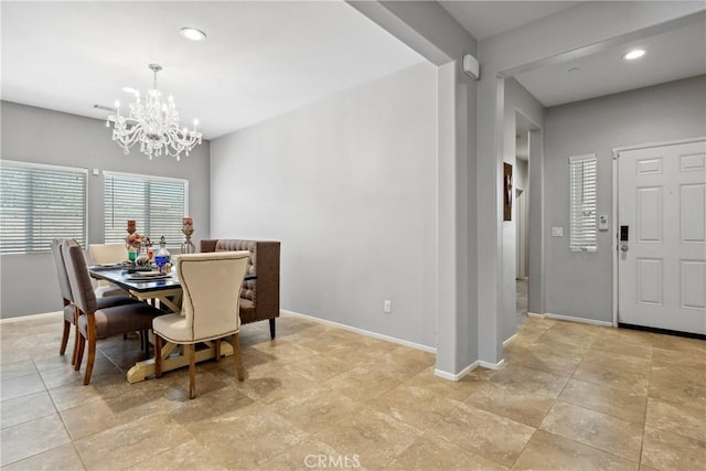 42667 Gazapo Ct, Indio, CA 92203 - dining space featuring a chandelier, baseboards, and recessed lighting