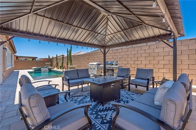 42667 Gazapo Ct, Indio, CA 92203 - fenced backyard with outdoor lounge area, a gazebo, and a patio area