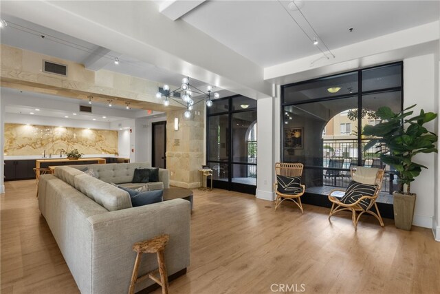 24585 Town Center Dr Unit 4308, Valencia, CA 91355 - common area featuring beam ceiling and a sink