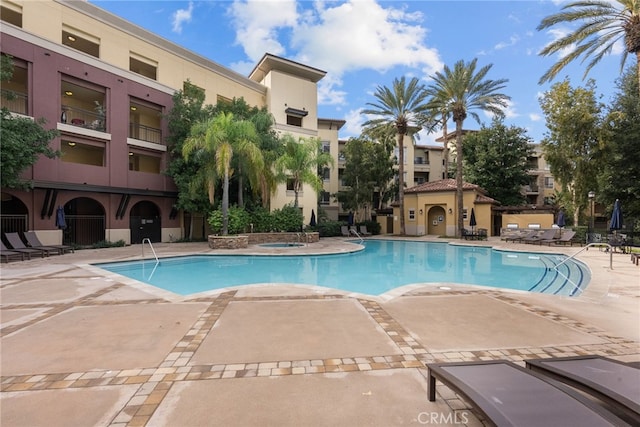 24585 Town Center Dr Unit 4308, Valencia, CA 91355 - community pool featuring a patio
