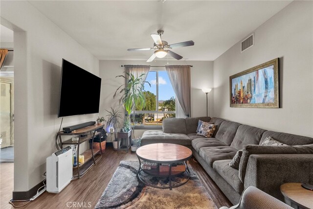 24585 Town Center Dr Unit 4308, Valencia, CA 91355 - living room with a ceiling fan and wood finished floors