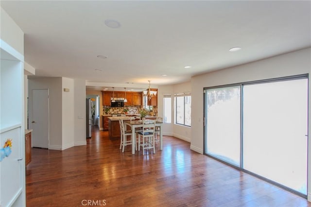 824 Leyland Dr, Diamond Bar, CA 91765 - dining area with dark wood finished floors, recessed lighting, and a chandelier
