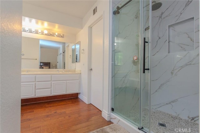 824 Leyland Dr, Diamond Bar, CA 91765 - full bath featuring hardwood / wood-style floors, a marble finish shower, and double vanity