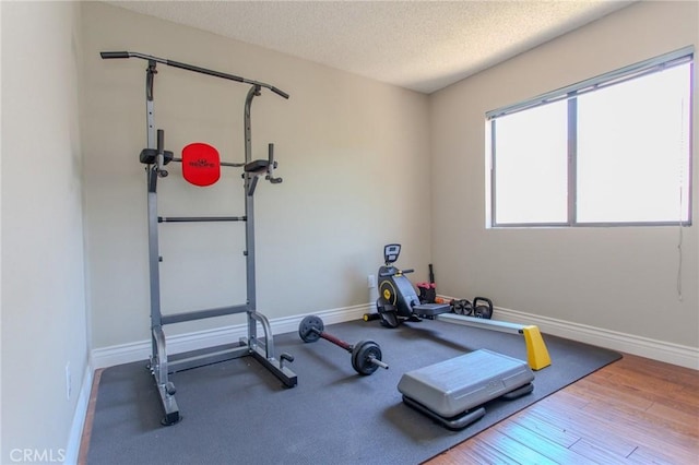 824 Leyland Dr, Diamond Bar, CA 91765 - workout area featuring a textured ceiling and wood finished floors