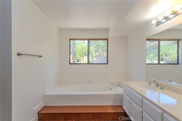 824 Leyland Dr, Diamond Bar, CA 91765 - full bath with a garden tub, vanity, and healthy amount of natural light