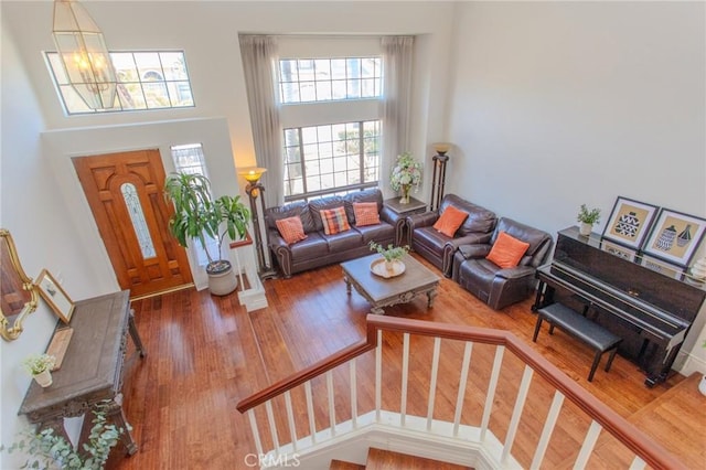 824 Leyland Dr, Diamond Bar, CA 91765 - living area featuring a towering ceiling, wood finished floors, and stairs