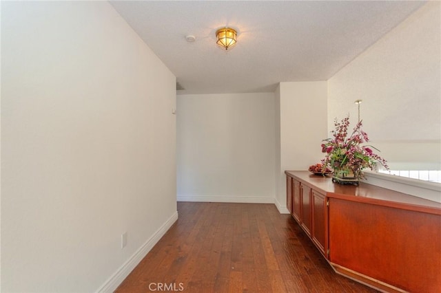824 Leyland Dr, Diamond Bar, CA 91765 - hallway featuring dark wood-style floors and baseboards