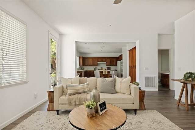 1665 Valley Falls Ave, Redlands, CA 92374 - living area with wood finished floors and baseboards