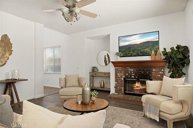1665 Valley Falls Ave, Redlands, CA 92374 - living area with a brick fireplace, wood finished floors, baseboards, and ceiling fan