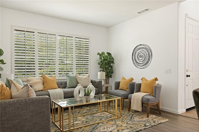 1665 Valley Falls Ave, Redlands, CA 92374 - living area featuring wood finished floors and baseboards