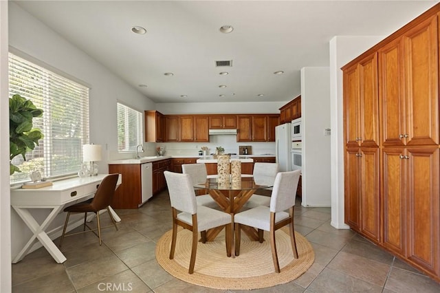 1665 Valley Falls Ave, Redlands, CA 92374 - dining room with light tile patterned floors and recessed lighting