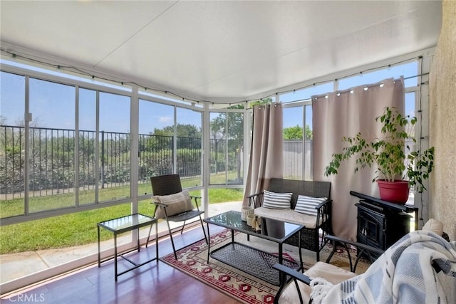 143 Brisas St, Oceanside, CA 92058 - sunroom / solarium featuring a wood stove and wood finished floors