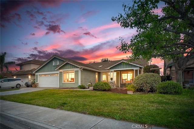 143 Brisas St, Oceanside, CA 92058 - view of front of home with a yard, a garage, board and batten siding, and concrete driveway