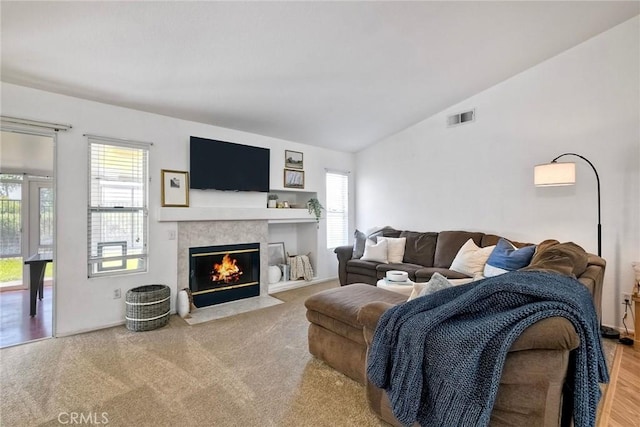 143 Brisas St, Oceanside, CA 92058 - living area featuring plenty of natural light, a fireplace, and lofted ceiling