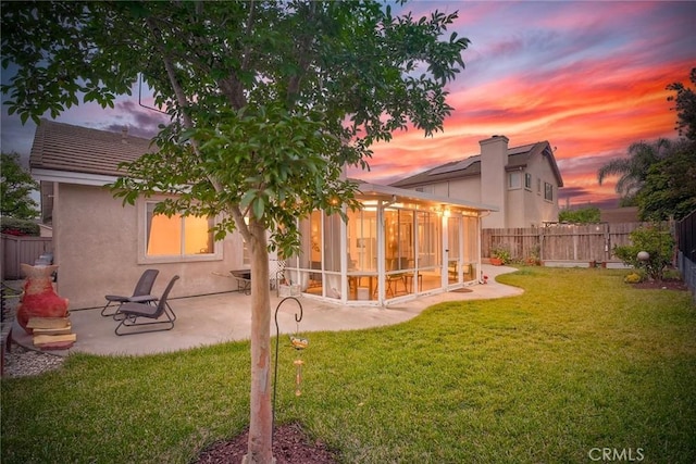 143 Brisas St, Oceanside, CA 92058 - back of house at dusk with a patio and stucco siding