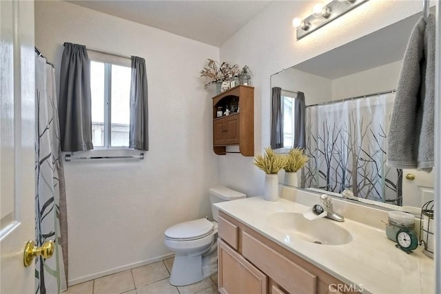 143 Brisas St, Oceanside, CA 92058 - bathroom with toilet, vanity, tile patterned flooring, a shower with shower curtain, and baseboards