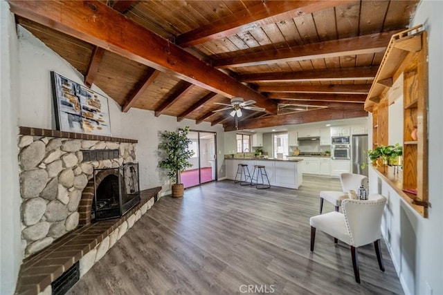 17470 Krameria Ave, Riverside, CA 92504 - living area with wooden ceiling, wood finished floors, a ceiling fan, and a fireplace