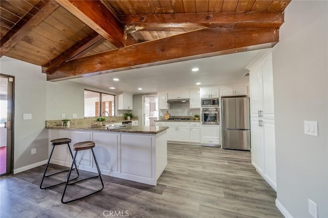 17470 Krameria Ave, Riverside, CA 92504 - kitchen featuring stainless steel appliances, light wood-style flooring, wooden ceiling, recessed lighting, and white cabinetry