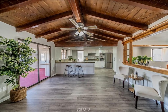 17470 Krameria Ave, Riverside, CA 92504 - living room with dark wood finished floors, wood ceiling, and a ceiling fan