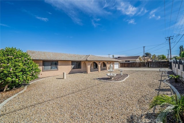17470 Krameria Ave, Riverside, CA 92504 - rear view of house featuring stucco siding and a tiled roof