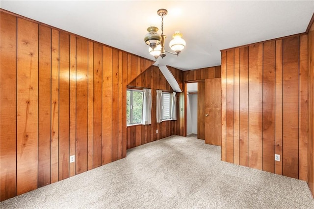 26972 State Highway 189, Blue Jay, CA 92317 - carpeted spare room with a chandelier and wood walls