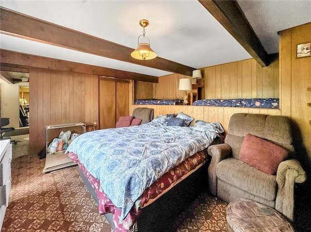 113 Fremont Rd, Lake Arrowhead, CA 92352 - bedroom with beamed ceiling, wooden walls, and carpet floors