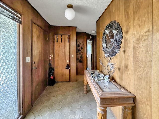 113 Fremont Rd, Lake Arrowhead, CA 92352 - entryway with stone floors and wood walls