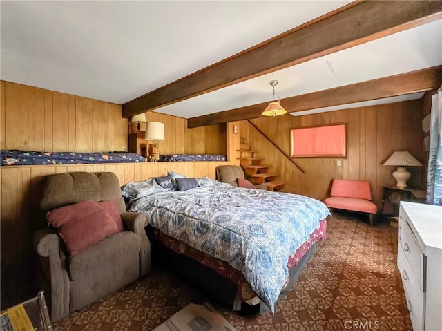 113 Fremont Rd, Lake Arrowhead, CA 92352 - bedroom featuring wood walls, beam ceiling, and carpet