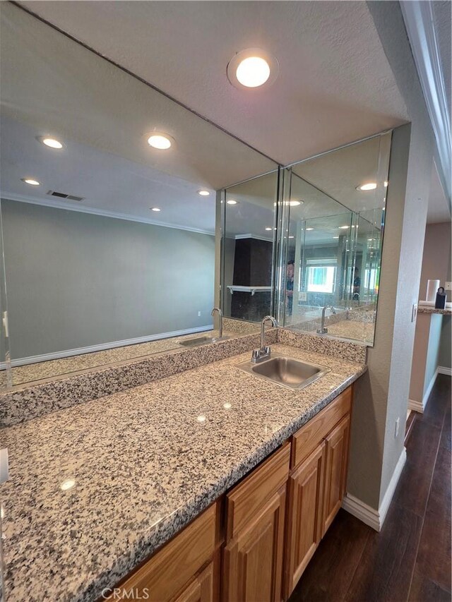 21901 Moneta Ave Unit 21, Carson, CA 90745 - bathroom featuring vanity, wood finished floors, and recessed lighting