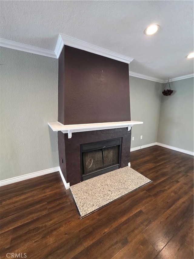 21901 Moneta Ave Unit 21, Carson, CA 90745 - unfurnished living room with a fireplace, wood finished floors, ornamental molding, and recessed lighting