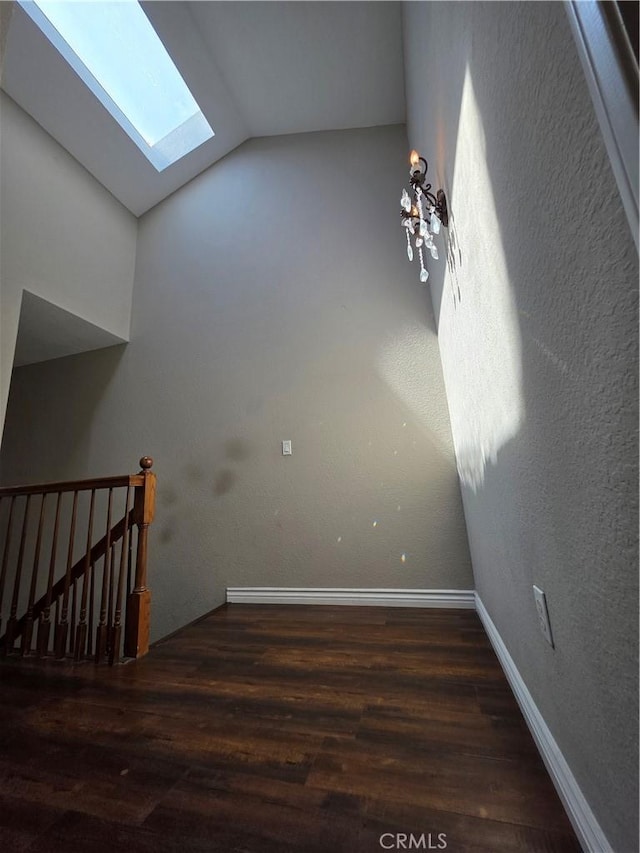 21901 Moneta Ave Unit 21, Carson, CA 90745 - unfurnished room featuring a skylight, wood finished floors, and lofted ceiling