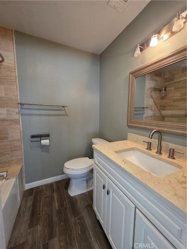 21901 Moneta Ave Unit 21, Carson, CA 90745 - full bath with vanity, wood finished floors, and bathtub / shower combination