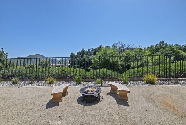 23463 Canterbury Way, Murrieta, CA 92562 - view of patio / terrace with a fire pit