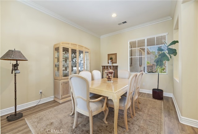 23463 Canterbury Way, Murrieta, CA 92562 - dining room with ornamental molding, light wood-type flooring, and baseboards