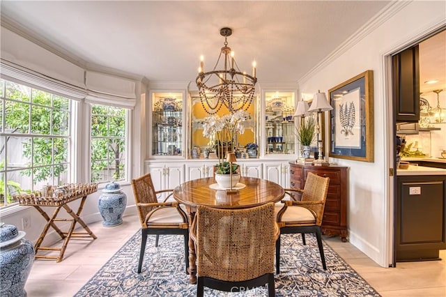 25536 Rue Terrase Unit 17, Laguna Niguel, CA 92677 - dining area featuring a chandelier and ornamental molding