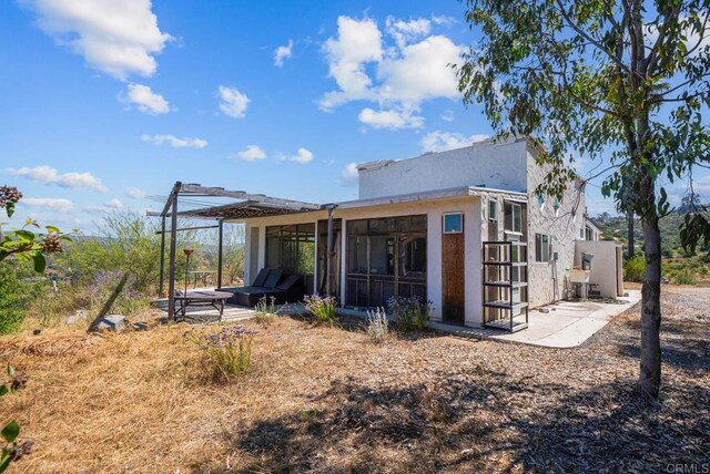 2620 Mar Vinga, Fallbrook, CA 92028 - back of house with a sunroom and stucco siding