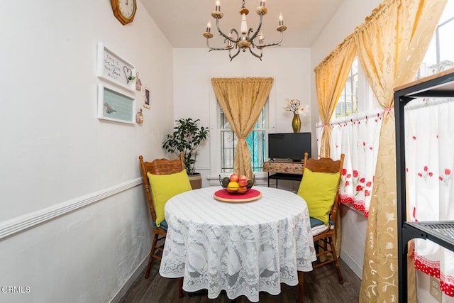 3247 La Clede Ave, Los Angeles, CA 90039 - dining area with a chandelier, wood finished floors, and baseboards