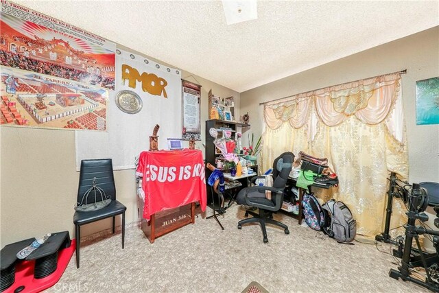 333 W D St, Wilmington, CA 90744 - carpeted home office featuring a textured ceiling