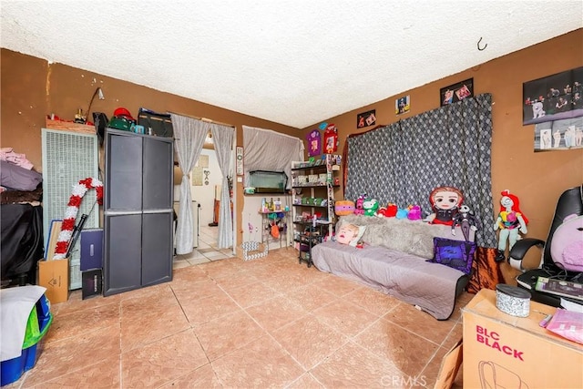 333 W D St, Wilmington, CA 90744 - living area with a textured ceiling and tile patterned flooring