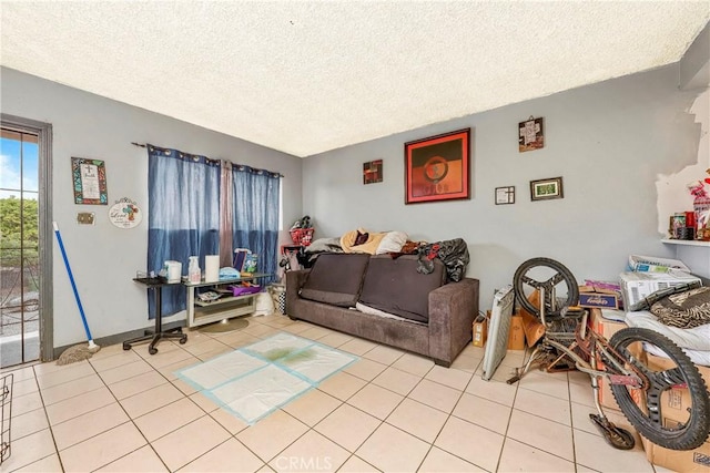333 W D St, Wilmington, CA 90744 - living room featuring a textured ceiling and light tile patterned floors