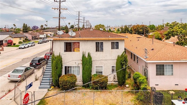 333 W D St, Wilmington, CA 90744 - view of front of home featuring stucco siding and a residential view