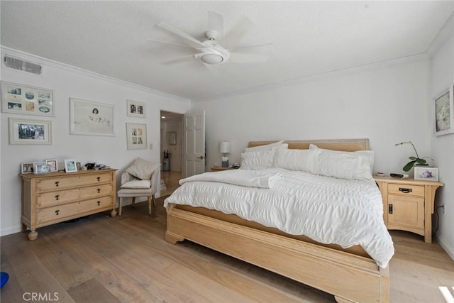 4420 Conchita Way, Tarzana, CA 91356 - bedroom featuring light wood-style floors, crown molding, ceiling fan, and baseboards