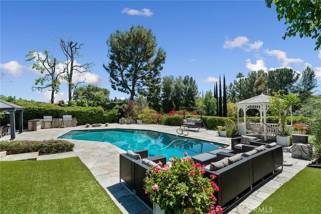 4420 Conchita Way, Tarzana, CA 91356 - outdoor pool with a gazebo, a patio area, an outdoor kitchen, and a yard