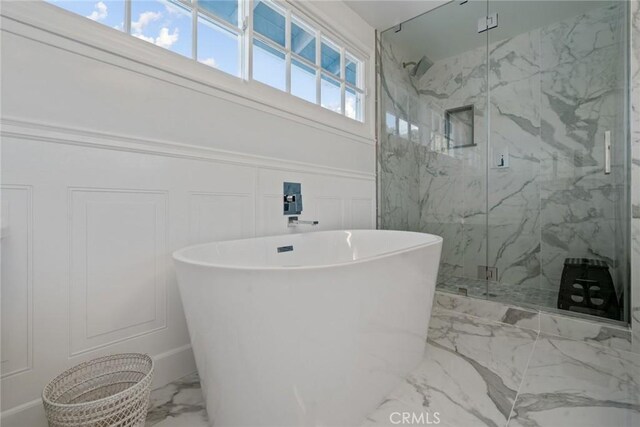 4420 Conchita Way, Tarzana, CA 91356 - full bathroom featuring a decorative wall, marble tiled flooring, a soaking tub, and a marble finish shower